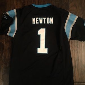 Nike Youth 14/16 Cam Newton Jersey.